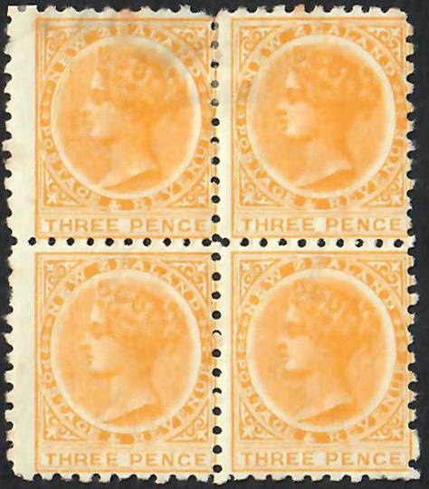 NEW ZEALAND 1882 Victoria 1st Second Sideface 3d Yellow. Perf 10. Block of 4. Top pair hinged. Looks very good from the front. -