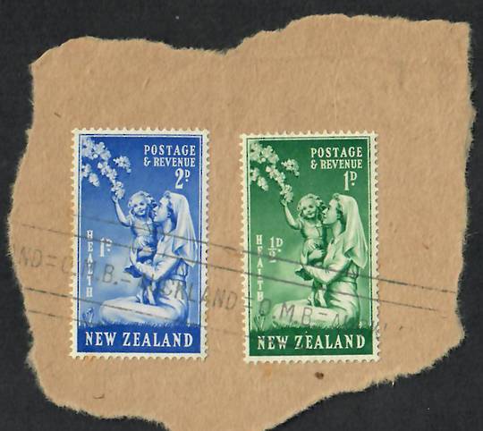 NEW ZEALAND Postmark Auckland Roller Cancel Auckland OMB on pair of 1949 Health on piece. - 21881 - Postmark