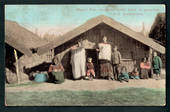 Coloured Postcard of Maori Pah showing baby born in the grounds of the exhibition. - 248330 - Postcard