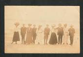 Real Photograph of people taken by Dick Simpson at Dunedin. - 249144 - Postcard