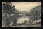 Postcard by Muir and Moodie of Queenstown Lake Wakatipu from the park in the evening. - 249435 - Postcard