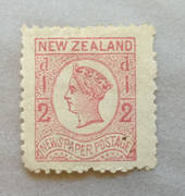 NEW ZEALAND 1873 Newspaper ½d Pale Dull Rose. Watermark Star. Perf nearly 12. Dull corner. Wing margin. - 39453 - Mint