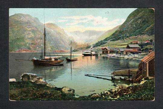 Postcard addressed to Terepuki in New Zealand. Scene of shipping including a steamer and fishing vessels in a bay. No identifica