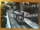 Postcard from Railway around Exmoor series. Reproductions of old Real Photographs. Western Region 1451 with a train for Dulverto