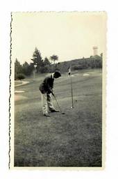 Small Photograph of Golfer putting. With the flag in??? - 41502 - Photograph