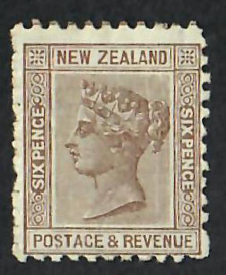 NEW ZEALAND 1882 Victoria 1st Second Sideface 6d Brown. Perf 11. The perfs down one side are not punched out But they are all th