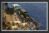 War in the South Atlantic. Coloured postcard. Loading Vehicles and Heavy Equopment into a Landing Craft. - 44131 - Postcard