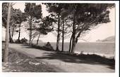 Real Photograph by G E Woolley of Omapere Road Opononi. - 44776 -