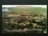 Coloured postcard. Complete Panoramic View of Waihi from above the Waihi Gold Mining Co Battery. The Grand Junction Battery is i