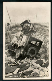 Photograph of Shattered Road (and Cars) Napier Earthquake 3/2/1931. - 47915 - Postcard