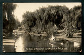 Real Photo by Radcliffe of the Avon at Fendalton Christchurch. Young lady in rowboat. - 48401 - Postcard