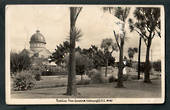 Real Photograph by A B Hurst & Son of Roman Catholic Church Basilica from the Gardens Invercargill. - 49319 - Postcard