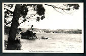 Real Photograph by A B Hurst & Son of Half Moon Bay Stewart Island. The original price of the card is shown on the reverse 4d. -