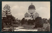Postcard of Gardens showing Roman Catholic Cathedral Invercargill. - 49378 - Postcard