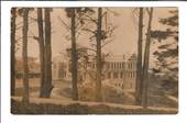 Real Photograph of substantial building through trees. Probably Christchurch. - 49781 - Postcard