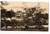 Real Photograph published by Tanner of Ohinemutu showing the Maori Church the pa and Mokoia Island Rotorua. - 69619 - Postcard