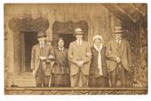 Real Photograph of three tourist and two guides in front of a meeting house. - 69672 - Postcard