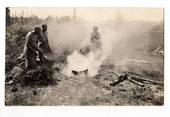 Real Photograph. Cooking in boiling pool Whakarewarewa. - 69680 - Postcard