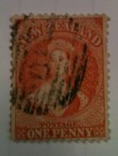 NEW ZEALAND 1862 Full Face Queen 1d Orange. Perforated. Light cancel that covers the face but the face is still clearly visible.