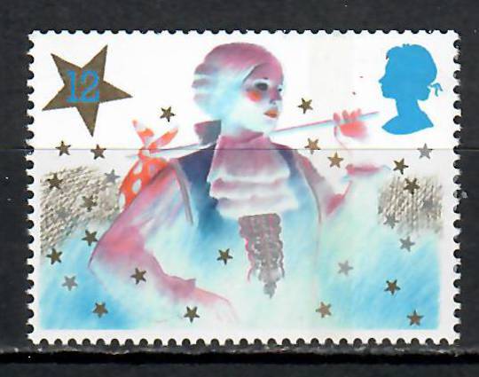 GREAT BRITAIN 1985 Christmas 12p from the £2.40 Discount Stamp Booklet. Shows a blue underprint of a double lined star on the re