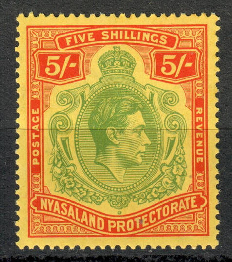 NYASALAND 1938 Geo 5th Definitive 5/- Pale Green and red on Yellow. Very lightly hinged. - 8151 - LHM