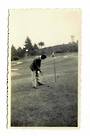 Small Photograph of Golfer putting. With the flag in??? - 41502 - Photograph
