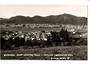 Real Photograph by T G Palmer & Son of Whangarei from the Western Hills showing Kensington Park. - 44828 - Postcard
