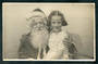 Real Photograph of Young Girl with Santa. - 48474 - Postcard