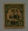 NEW GUINEA 1915 Official 1d on 5pf Green. Superb copy with the smallest evidence of hinging but badly toned. Flaw damaged G. Sel