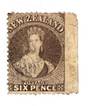 NEW ZEALAND 1862 Full Face Queen 6d Black-Brown. Pelure paper. Perf 13 at Dunedin. Superb copy with clear perfs on 3 sides and